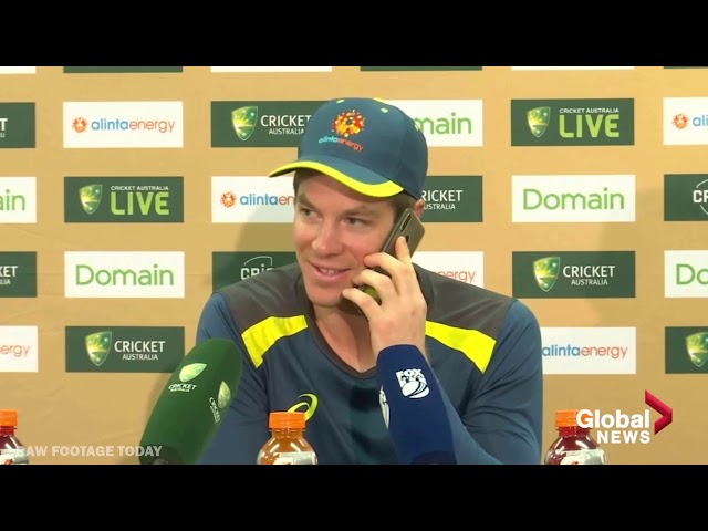 Captain of Australian cricket team answers reporter's phone during press conference