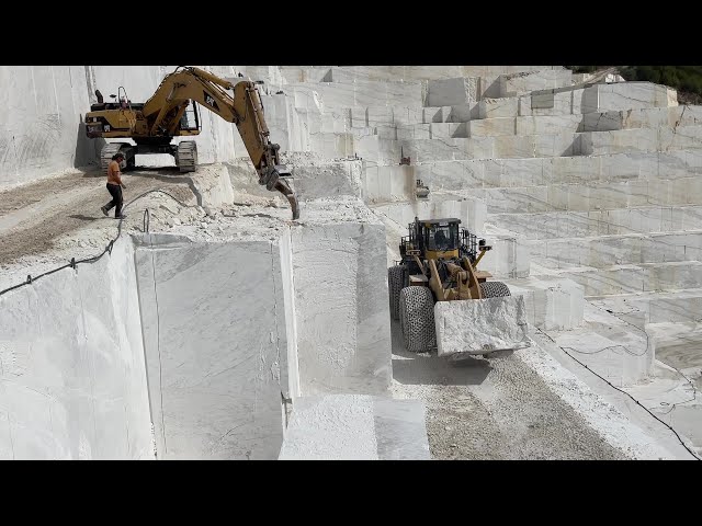 A Great Team Of Caterpillar And Komatsu Machineries Working Together On Birros Marble Quarries