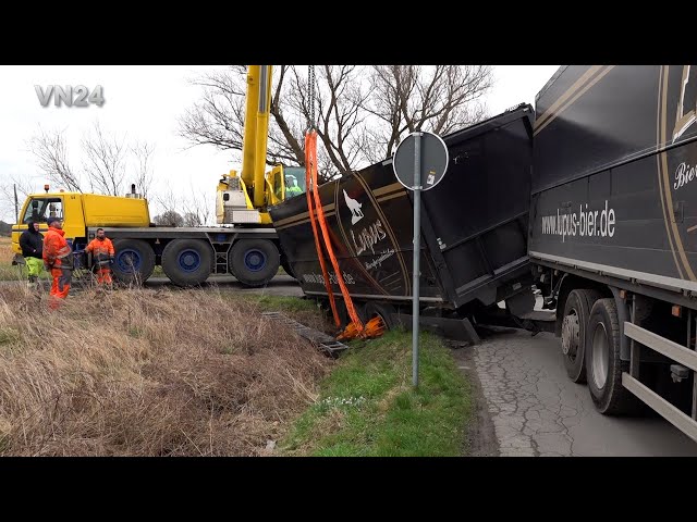 VN24 - GPS say: take this way! Truck trailer slides into ditch on a narrow road