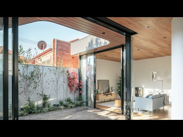 This Sunny Courtyard Home Has All The Right Curves
