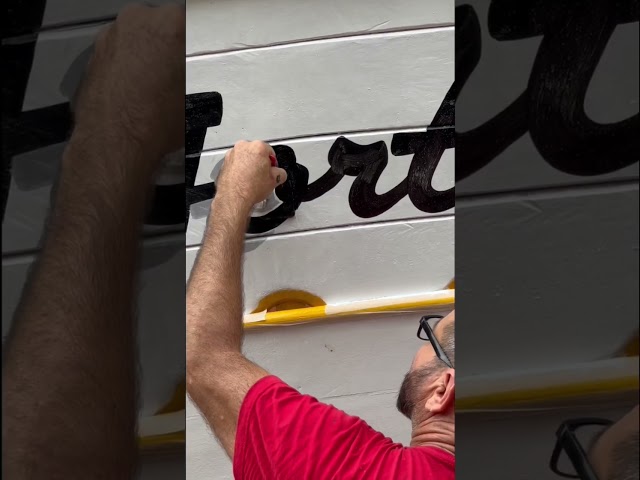 Mesmerizing freehand painting on our neighbors’ fishing boat! #shorts