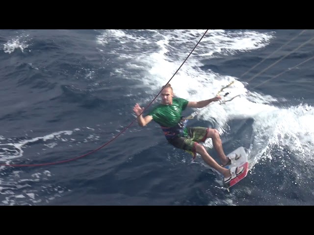 Kite surfer Ross Harte jumps the height of our mast holding halyard!
