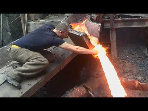Man Puts Hand In Molten Metal