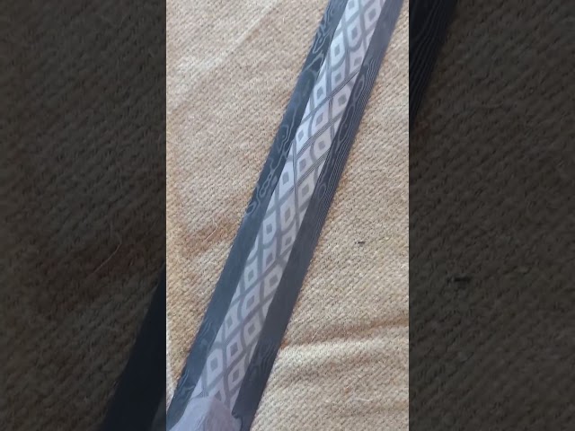 Pattern-welded (damascus) Roman period sword from Illerup.