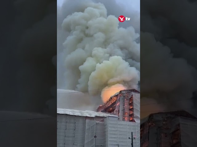 180ft burning spire collapses in Copenhagen #news #shorts