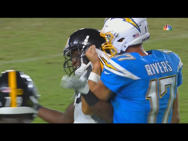 Philip Rivers Grabs Hold of Mike Hilton After Interception