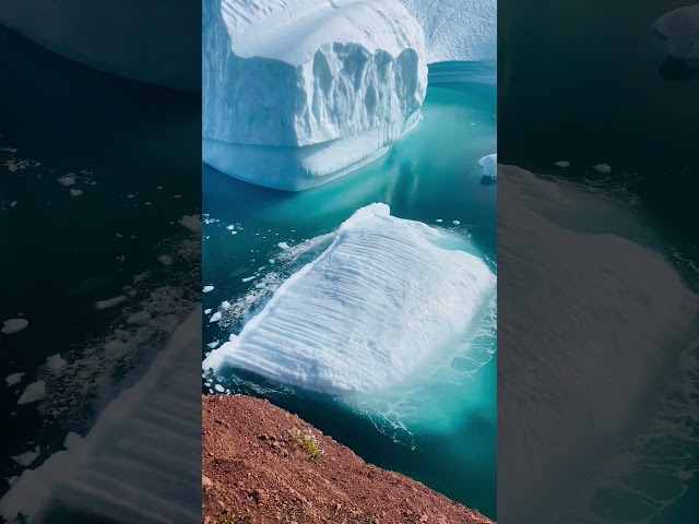 The glacier melts and rolls away