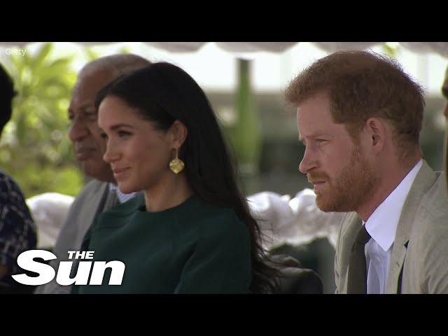 I watched as Meghan put on a brilliant acting performance as Harry stared daggers, royal expert says