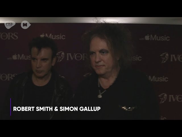 Robert Smith and Simon Gallup pick up the PRS for Music Icon Award at The Ivor Novello Awards 2022