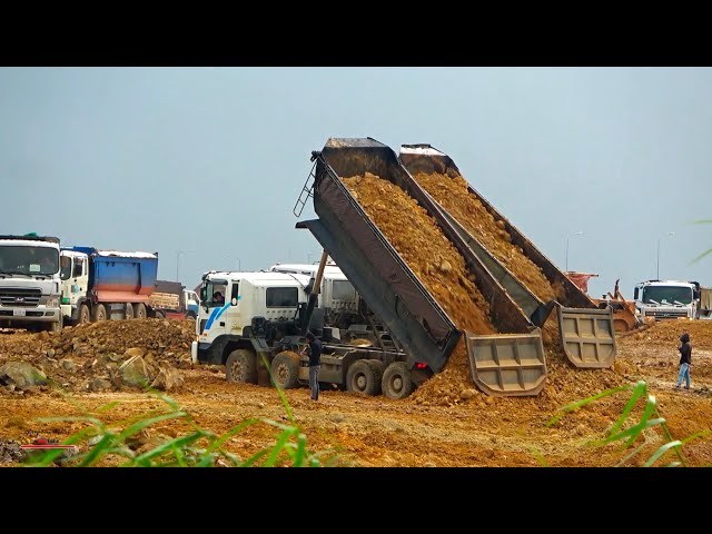powerful machines spread out soils dumper truck with dozer