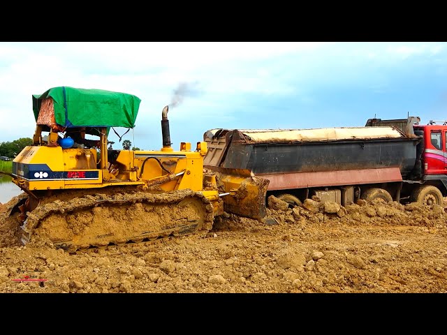 Interesting Bulldozer Operator Getting Heavy Truck Dumper Stuck Out Of Mud