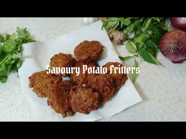Crispy Herby Potato Fritters. Incredibly delicious snack, appetizer or with biriyani!