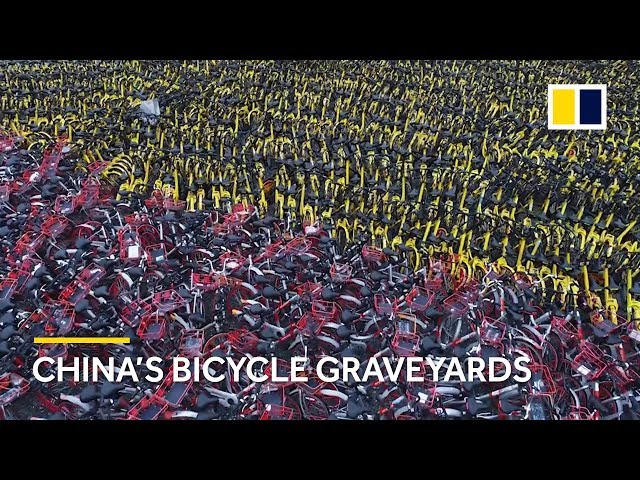 Drone footage shows thousands of bicycles abandoned in China as bike sharing reaches saturation