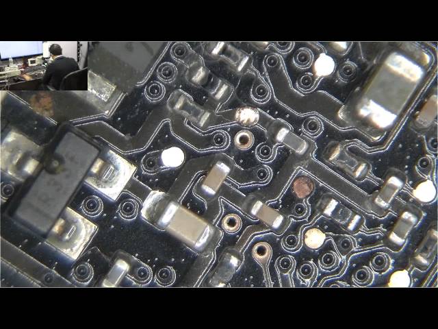 Drag soldering to repair Macbook Pro LVDS connector.