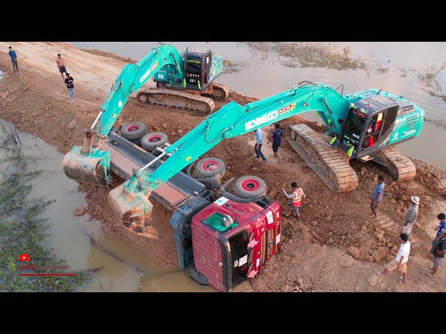 Unexpected​ Dumper Truck Fall Down Fails Operators Helping Recovery With Kobelco SK26lc And Sk200
