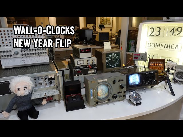 Wall of weird vintage electrical and electronic clocks new year flip