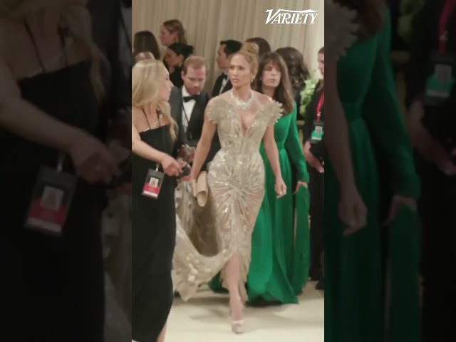 Jennifer Lopez poses for photos at the Met Gala.