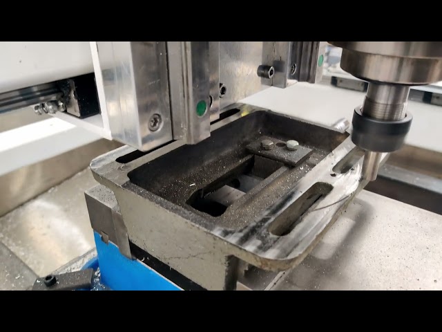 Facing the bottom of a cast iron drill press vice with BAP300r
