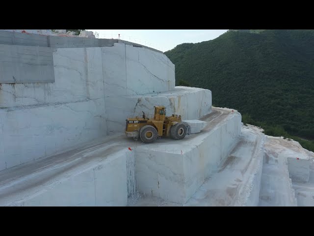 Caterpillar And Komatsu Wheel Loaders Working On Birros Marble Quarry In Greece