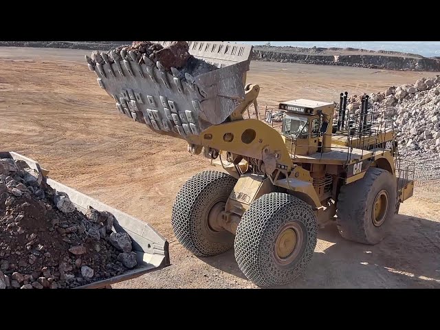 Huge Caterpillar 994 Wheel Loader Loading Caterpillar 777F Dumpers - Samaras Mining Group