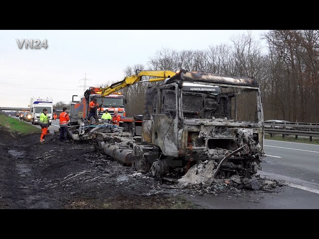 VN24 - Burnt-out MAN truck is recovered on the A2 highway near Hamm