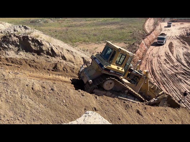 Caterpillar D6H Bulldozer Pushing Soil - Labrianidis Mining Works