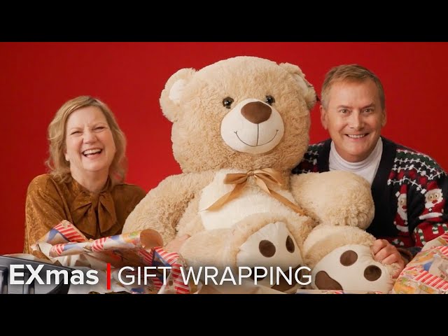 Michael Hitchcock and Kathryn Greenwood Compete in the EXmas Gift Wrapping Challenge