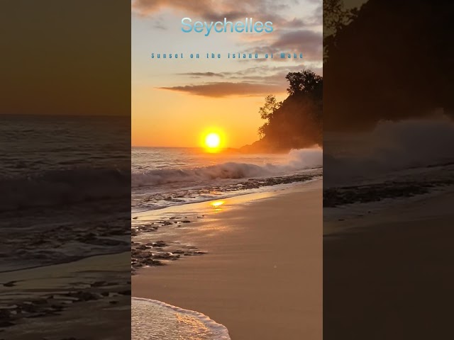 Seychelles sunset on beach in paradise