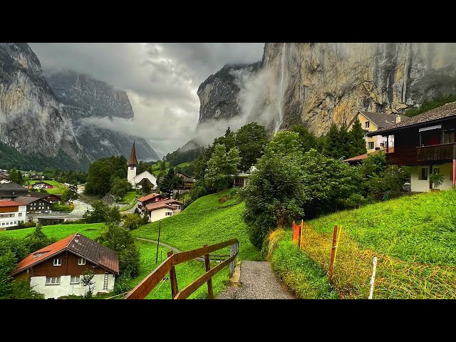 Lauterbrunnen, Switzerland - Rainy walk in the most beautiful Swiss village - Fairytale village