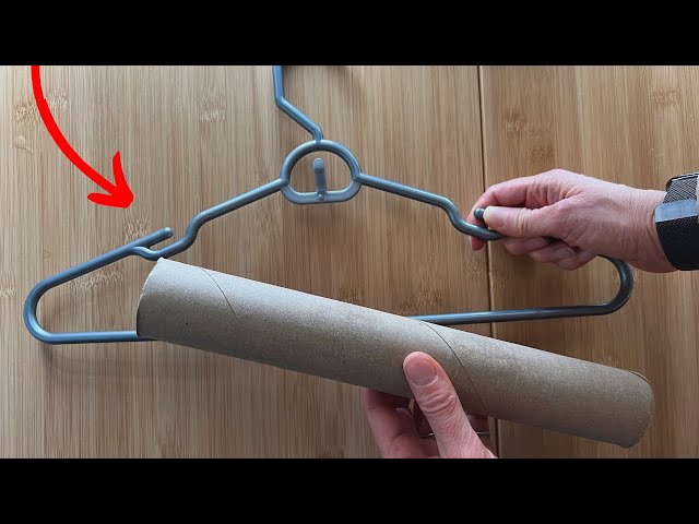 Slide a paper towel roll onto a hanger (this is BRILLIANT!)