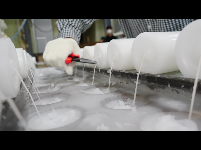 The process of making candles by skilled craftsmen. candle mass production site