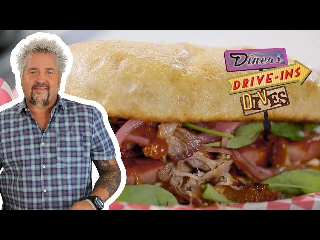 Guy Fieri Takes Down the 'Porkcules' Sandwich | Diners, Drive-Ins and Dives | Food Network