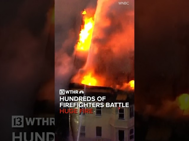 Hundreds of firefighters battle massive fire for hours