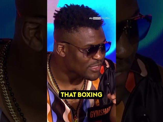 Francis Ngannou savagely clicks fingers at Tyson Fury in front row! 🥶