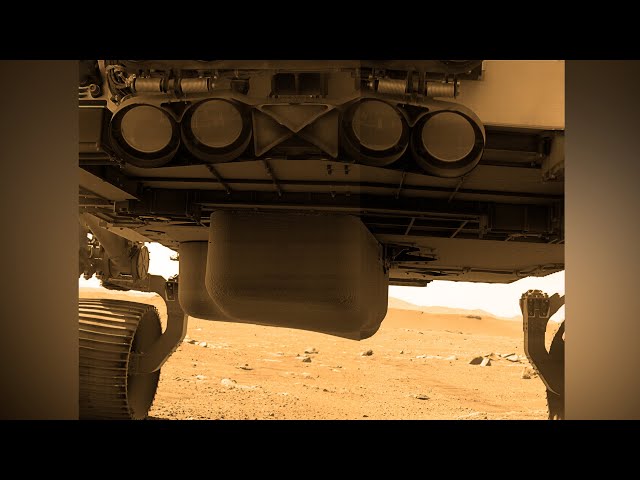 Perseverance’s first image of Helicopter Ingenuity on Mars under rover's belly