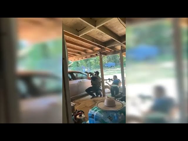 Former refugee captures video of Charlotte police shootout from his garage