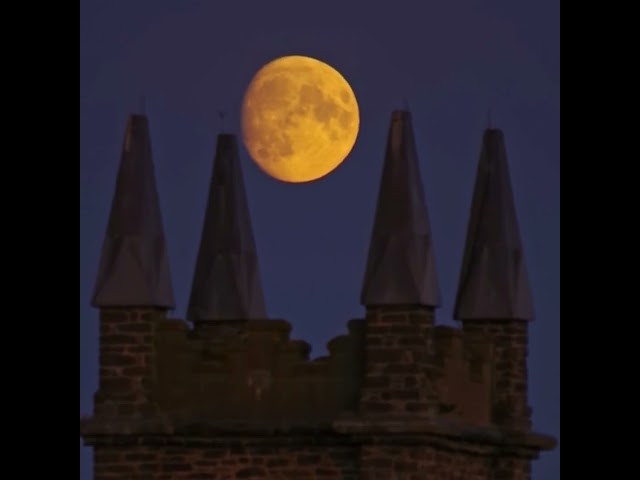 Moonrise over a church