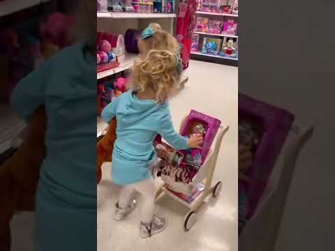 Twin baby girls shopping