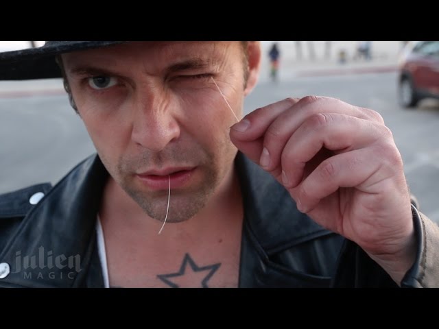 Magician pulls thread thru his Eye!!  Magic trick -Julien Magic