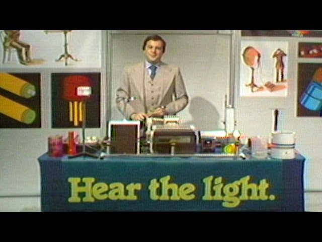 Bell Labs' Henry Feinberg Demonstrates Ways of Using Light to Transmit Sound Waves, 1978