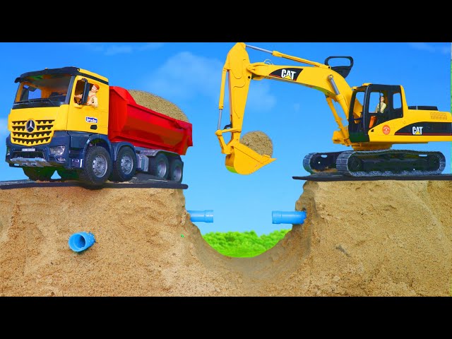 An Excavator and Truck Fix the Street Together