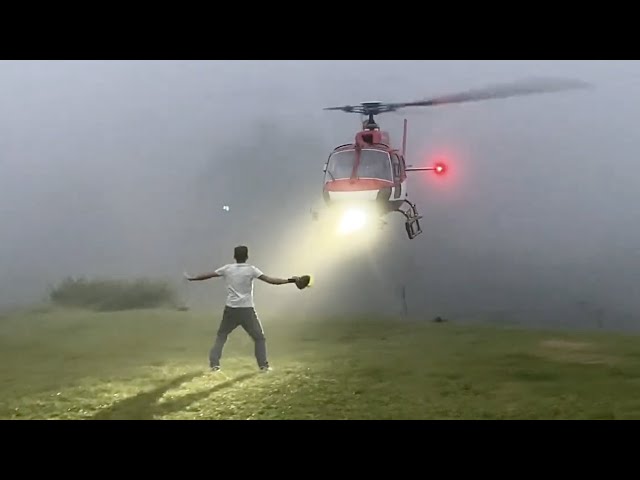 Man Gets Too Close To Landing Helicopter
