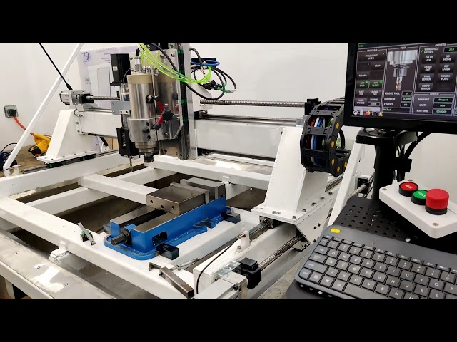 DIY CNC machine (Originally PrintNC) running after stainless steel skirt added