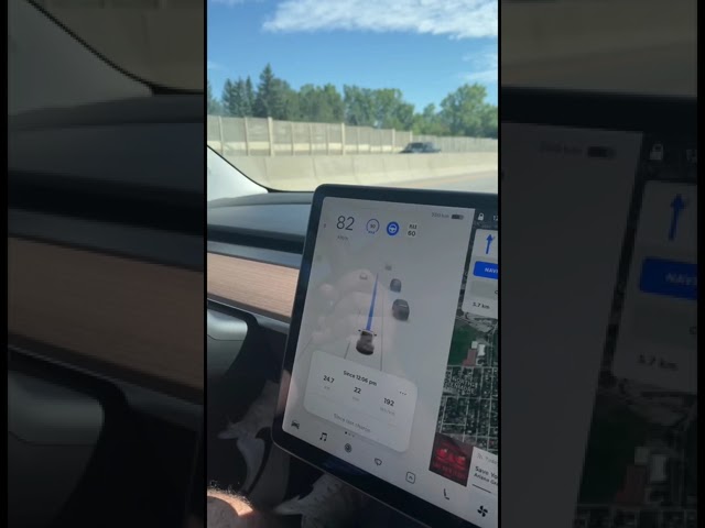 Tesla autopilot slowing down for merging car