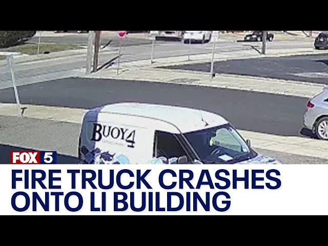 Fire truck crashes into Long Island building