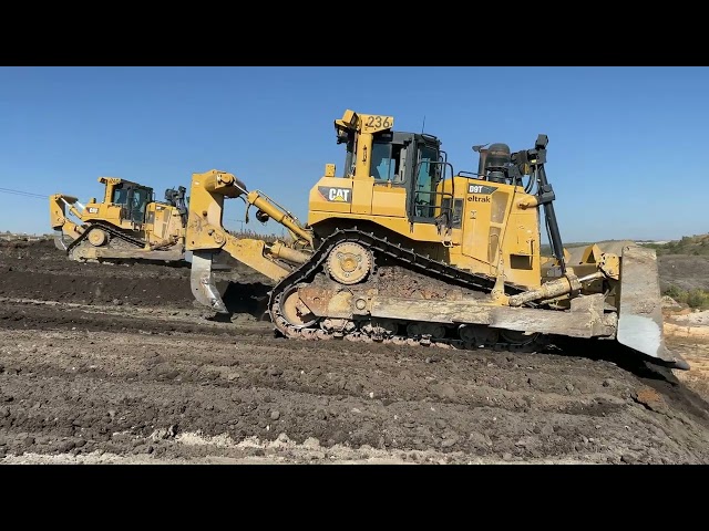 Two Caterpillar D9T Bulldozers Levelling Huge Mining Area - 4k