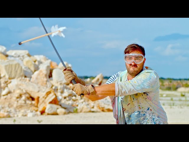 Slicing an Arrow in Half Mid-Air in Slow Motion - The Slow Mo Guys