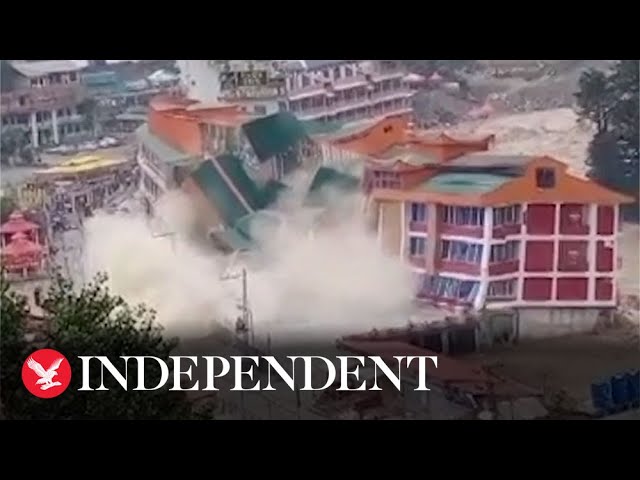 Moment hotel swept away during heavy flooding in Pakistan