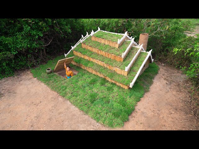 Building secret underground house with grass roof and clay