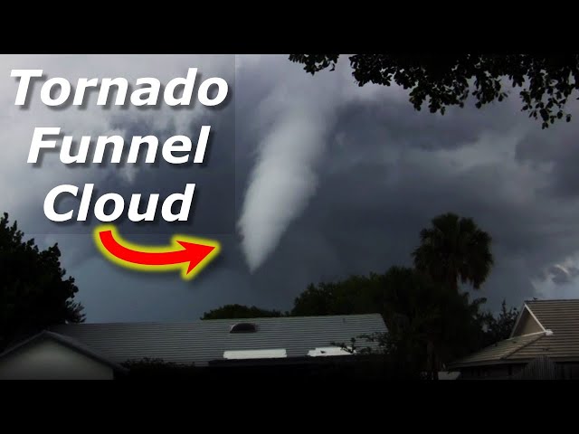 Tornado Funnel Cloud Over Roofs Ft. Lauderdale, FL